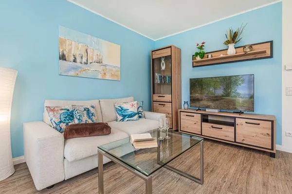 Wohnzimmer  Ferienwohnung Klippenblick mit Sauna, Kinderspielbereich und Fitnessraum