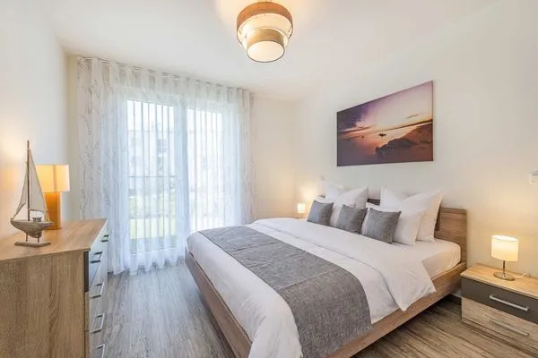Schlafzimmer  Ferienwohnung Klippenblick mit Sauna, Kinderspielbereich und Fitnessraum