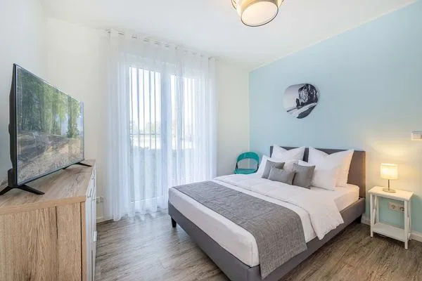 Schlafzimmer  Ferienwohnung Klippenblick mit Sauna, Kinderspielbereich und Fitnessraum