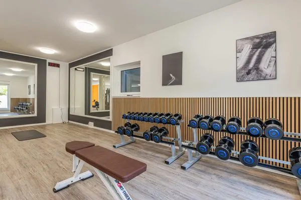Fitness  Ferienwohnung Goldfisch mit Balkon, Wellness- und Kinderspielbereich