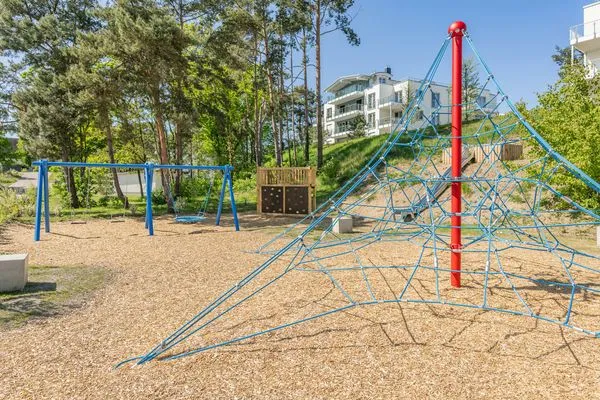 Spielanlage  Ferienwohnung Goldfisch mit Balkon, Wellness- und Kinderspielbereich