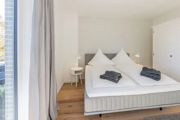 Schlafzimmer  Strandglück - mit Balkon, direkt am Strand