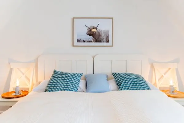Schlafzimmer mit Meerblick und 2 zusammengestellten Einzelbetten  Nordkiek No. 8