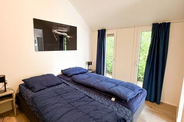  EuroParcs Marina Strandbad Chalet IJsselNest mit Zaun Haus Nr. 416