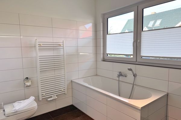 Moderne Erdgeschosswohnung mit 3 Schlafzimmern und Kamin