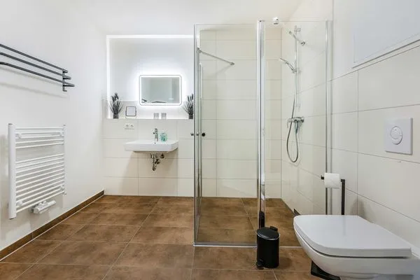 Badezimmer  Ferienwohnung Pia mit Fitness, Sauna  und Freizeitbereich