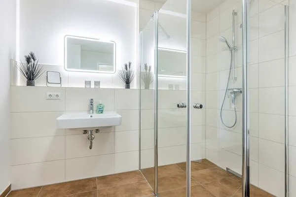 Badezimmer  Ferienwohnung Pia mit Fitness, Sauna  und Freizeitbereich