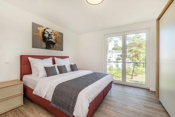 Schlafzimmer  Ferienwohnung Pia mit Fitness, Sauna  und Freizeitbereich