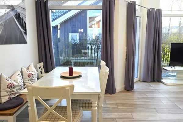 Wohnzimmer  Ferienhaus "Rachel III" im Ferienpark Holm an der Ostsee