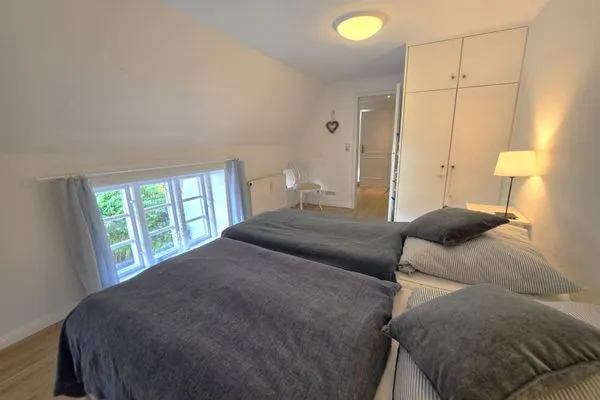 Schlafzimmer  Doppelhaushälfte unter Reet