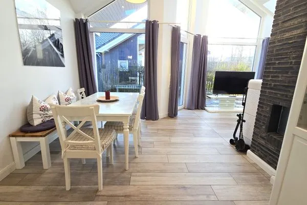 Wohnzimmer  Ferienhaus "Rachel III" im Ferienpark Holm an der Ostsee