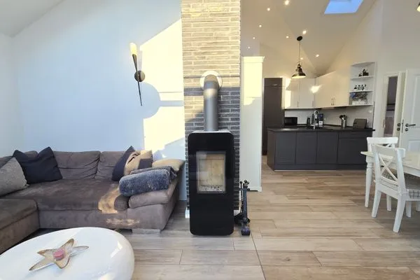 Wohnzimmer  Ferienhaus "Rachel III" im Ferienpark Holm an der Ostsee