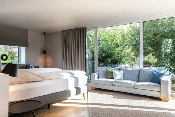  Ferienwohnung Lakeside Lodge Nonnenhorn - Wohn- und Schlafbereich