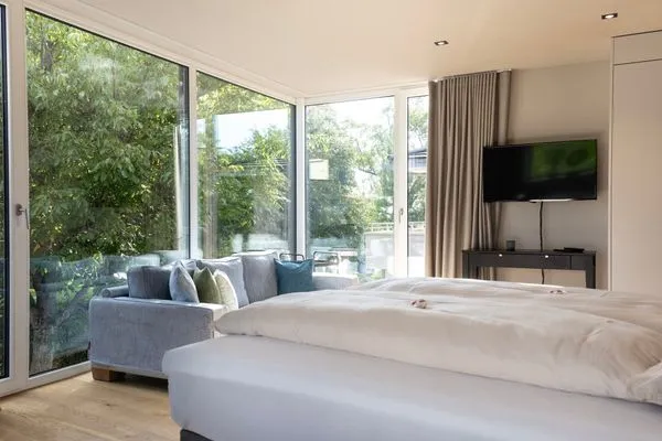  Ferienwohnung Lakeside Lodge Nonnenhorn - Wohn- und Schlafbereich