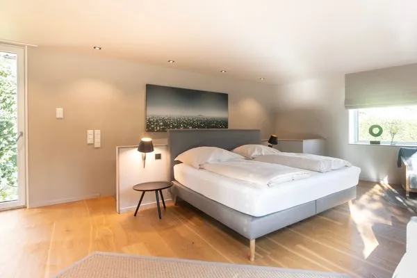  Ferienwohnung Lakeside Lodge Nonnenhorn - Wohn- und Schlafbereich