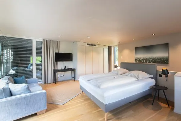  Ferienwohnung Lakeside Lodge Nonnenhorn - Wohn- und Schlafbereich