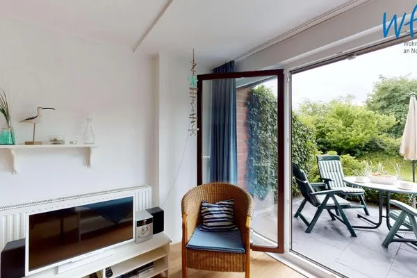 Wohnzimmer / Ausgang Terrasse Haus am Wattenmeer Ferienwohnung 2