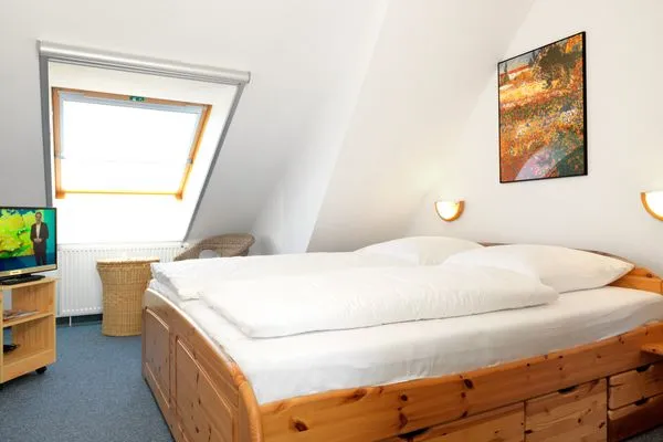 Schlafzimmer Landhaus am Meer Kleine Krabbe