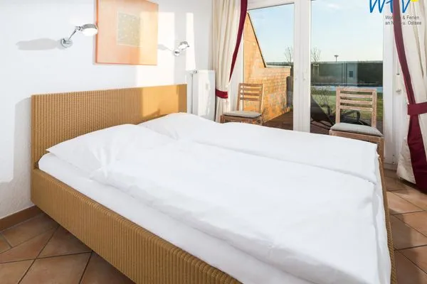 Schlafzimmer Haus Ebbe und Flut Ferienwohnung Deichläufer