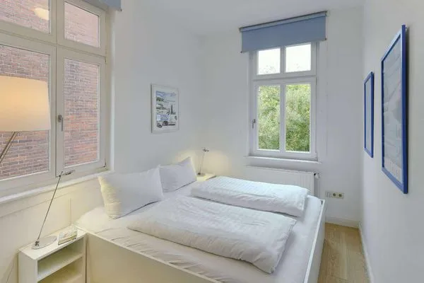 Schlafzimmer Logirhaus Doyen Ferienwohnung Robbenplate
