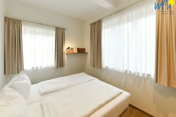 Schlafzimmer Haus Nordland Ferienwohnung Dünenkoje