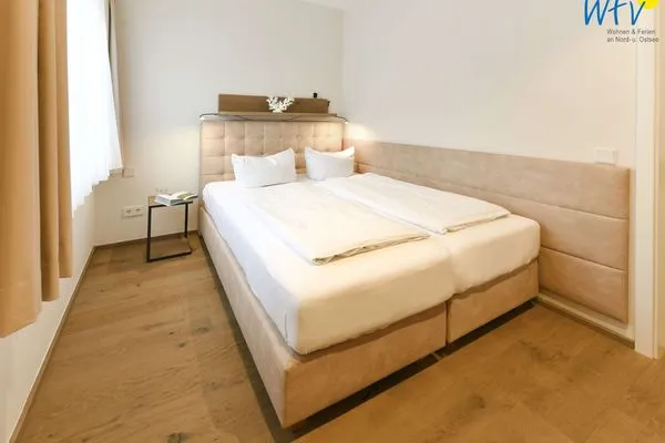 Schlafzimmer Haus Nordland Ferienwohnung Dünenkoje