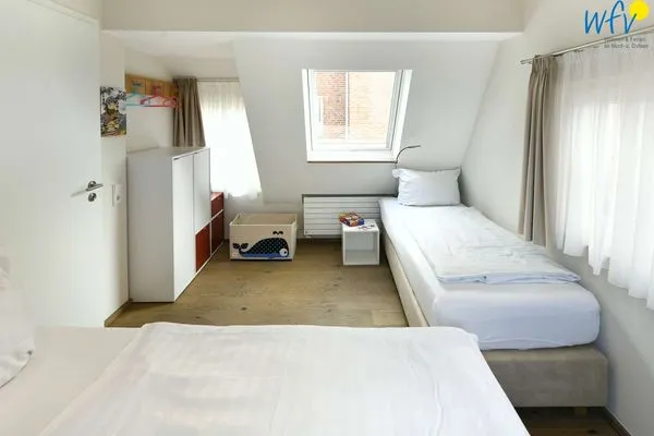 Schlafzimmer Haus Nordland Ferienwohnung Gartenblick