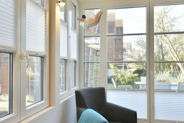 Sessel Haus Nordland Ferienwohnung Gartenblick