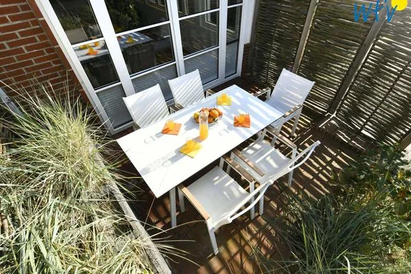 Terrasse Haus Nordland Ferienwohnung Gartenblick