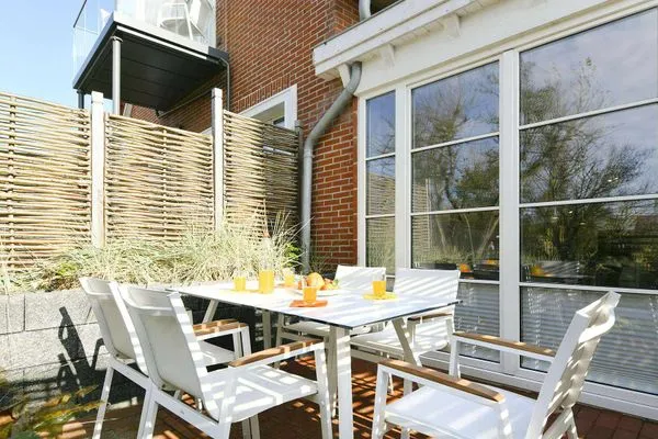 Terrasse Haus Nordland Ferienwohnung Gartenblick