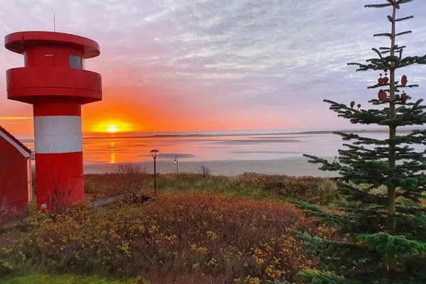 Haus Kap Hoorn in Wittdün, Sonnenaufgang Haus Kap Hoorn Ferienwohnung Seeblick