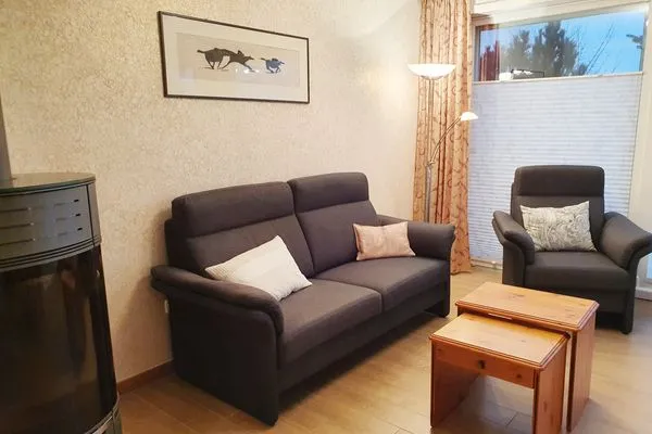 Wohnzimmer mit Sitzecke in der Ferienwohnung Passat im Haus Kap Hoorn in Wittdün auf Amrum Haus Kap Hoorn Ferienwohnung Passat
