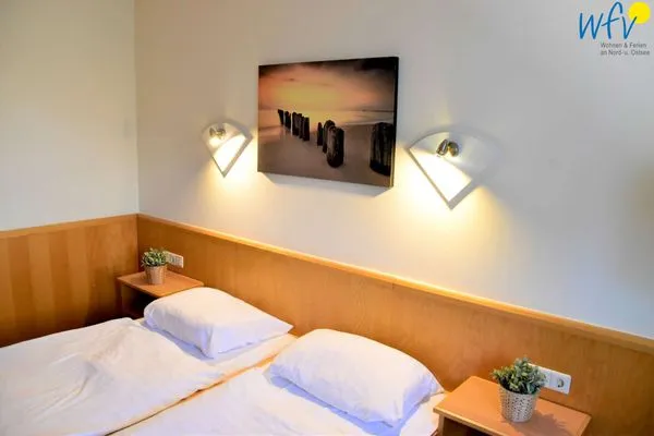 Schlafzimmer Appartement-Haus Regina Ferienwohnung Meeresbrise