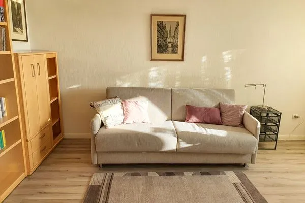 Schlafzimmer mit Schlafcouch in der Wohnung Gorch Fock im Haus Kap Hoorn in Wittdün auf Amrum Haus Kap Hoorn Ferienwohnung Gorch Fock