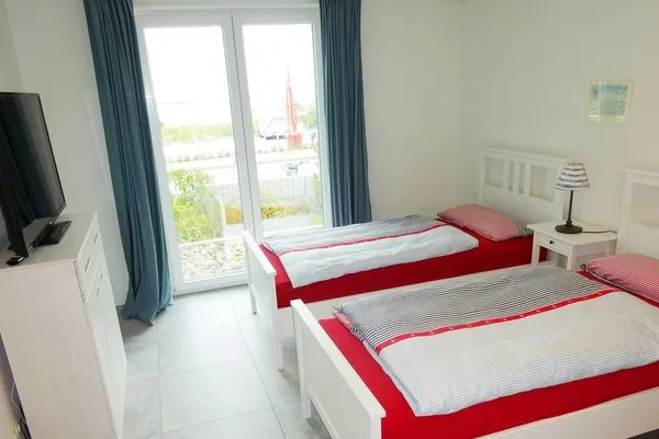 Schlafzimmer 2 in der Ferienwohnung Weiße Düne 4 in Wittdün auf Amrum Haus *Weiße Düne* Ferienwohnung Weiße Düne 4