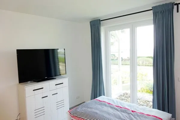Schlafzimmer 2 in der Ferienwohnung Weiße Düne 4 in Wittdün auf Amrum Haus *Weiße Düne* Ferienwohnung Weiße Düne 4