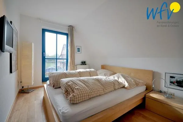 Schlafzimmer Ferienhaus Friesenblick Ferienwohnung 1