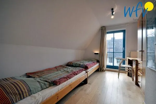 Schlafzimmer Ferienhaus Friesenblick Ferienwohnung 1