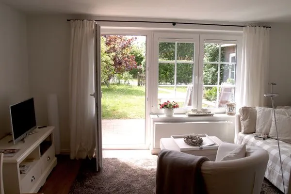 Wohnzimmer der Ferienwohnung Düne in Norddorf auf Amrum Haus Anneliese Bungalow Düne