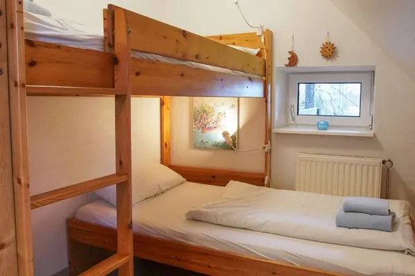 Schlafzimmer Ferienhaus Greune-Stee-Weg 103b Ferienwohnung Inselblick