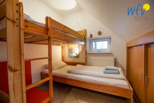 Schlafzimmer Ferienhaus Greune-Stee-Weg 103b Ferienwohnung Inselblick