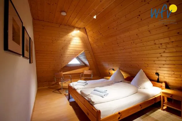 Schlafzimmer Ferienhaus Greune-Stee-Weg 103b Ferienwohnung Inselblick