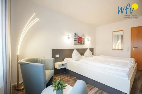 Schlafzimmer Appartement-Haus Regina Ferienwohnung StrandGut9