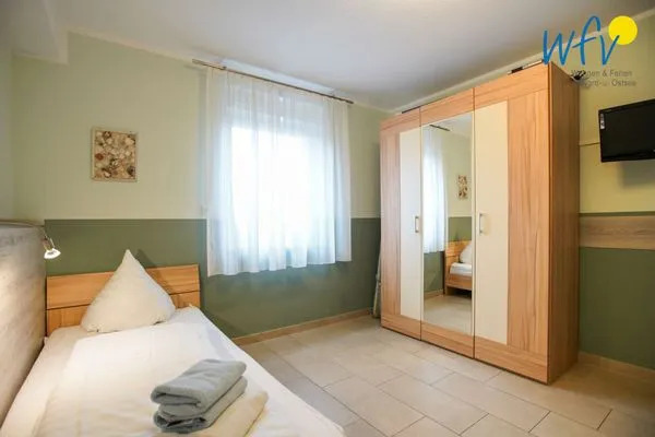 Schlafzimmer Weidenkieker Ferienwohnung 1