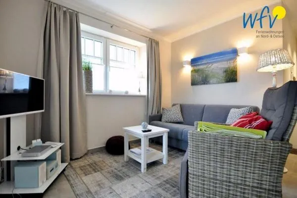 Wohnzimmer Bootshaus in den Dünen - 4 Ferienwohnung 2