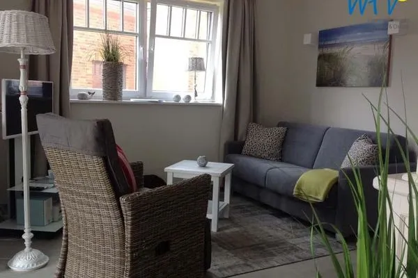 Wohnzimmer Bootshaus in den Dünen - 4 Ferienwohnung 2