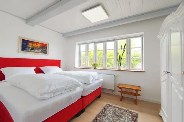 Schlafzimmer Erika's Hüs Ferienwohnung „Blä Waanang"