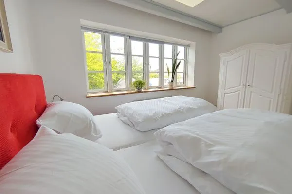 Schlafzimmer Erika's Hüs Ferienwohnung „Blä Waanang"