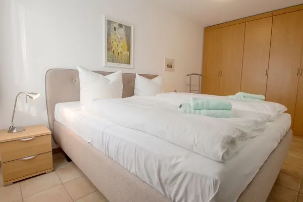 Schlafzimmer mit Doppelbett Residenz am Strand Ostseeglück - Wohnung 1-13