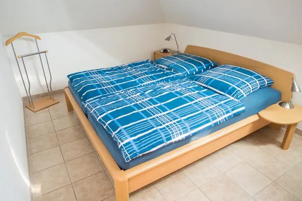 Schlafzimmer mit Doppelbett Residenz am Strand Wohnung 2-43